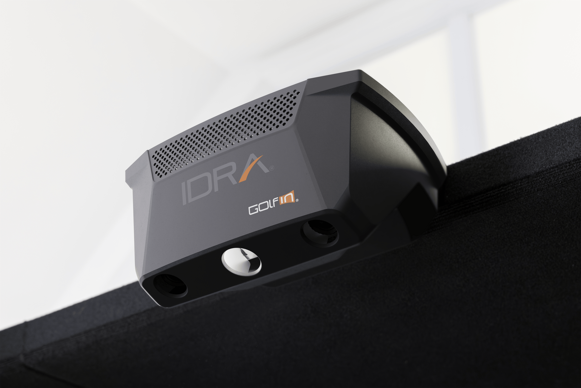 IDRA device mounted on a black surface with a white background