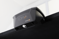 IDRA device mounted on a black surface with a white background