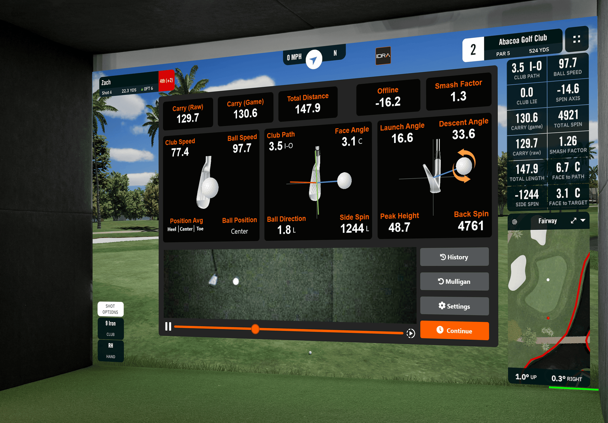 Golf simulator screen displaying various metrics and settings on a golf course background