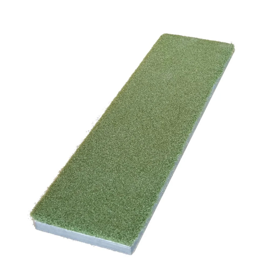 Green golf pad on a white background